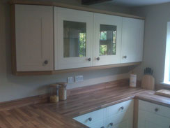 Another image displaying the shaker kitchen, displaying the beech style worktops